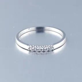 Anillo Oro Blanco con 5 Diamantes 0.10qtes