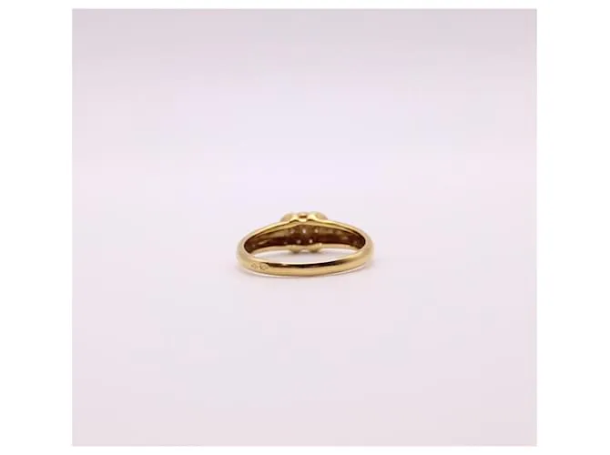 Autre Marque Anillo solitario de oro amarillo con pavé de diamantes 750%O Gold hardware 