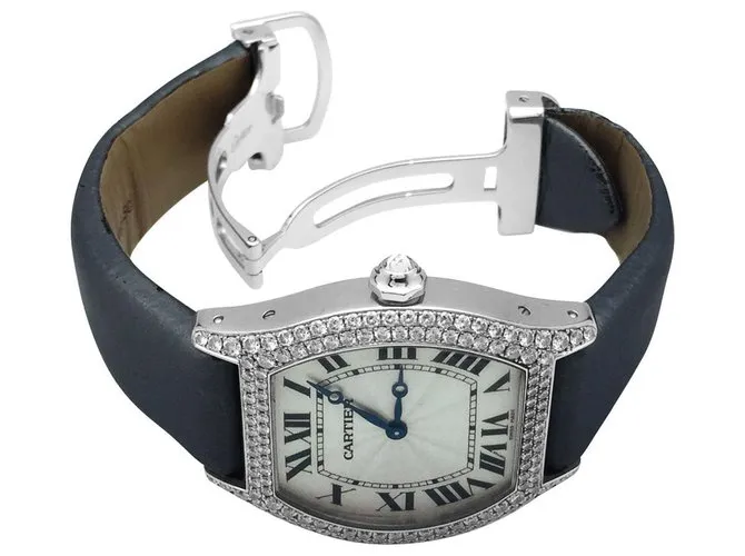 Reloj cartier, "Tortuga", en oro blanco, diamantes. 